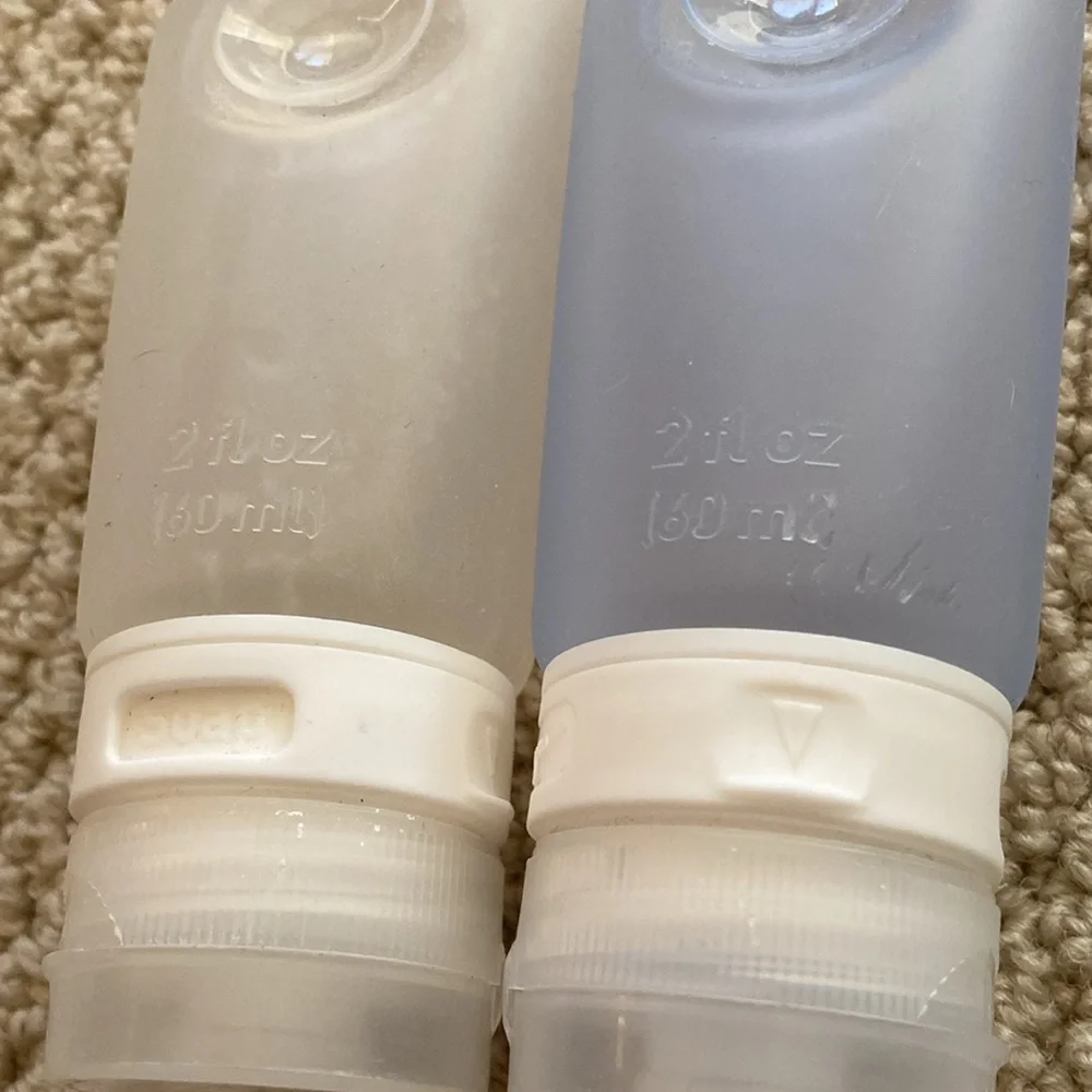 REI Reusable Liquids Containers Silicone Flexible Set Two Travel Airline Clear